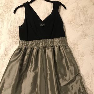 Black and silver v neck dress with taffeta skirt